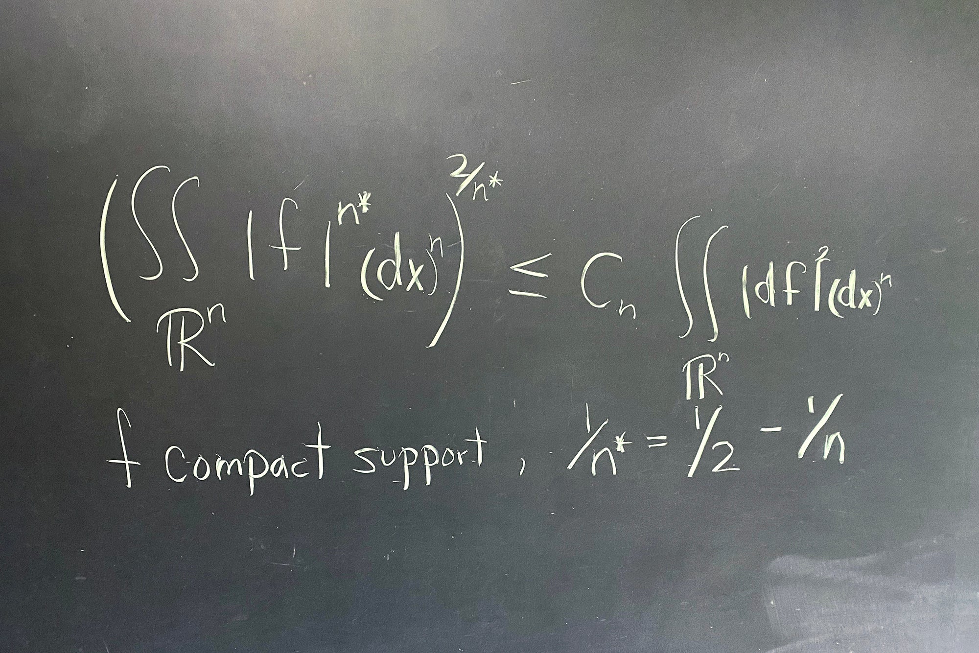 These Are the Most Beautiful Equations in Mathematics 2 Math equation written in white on a black board.